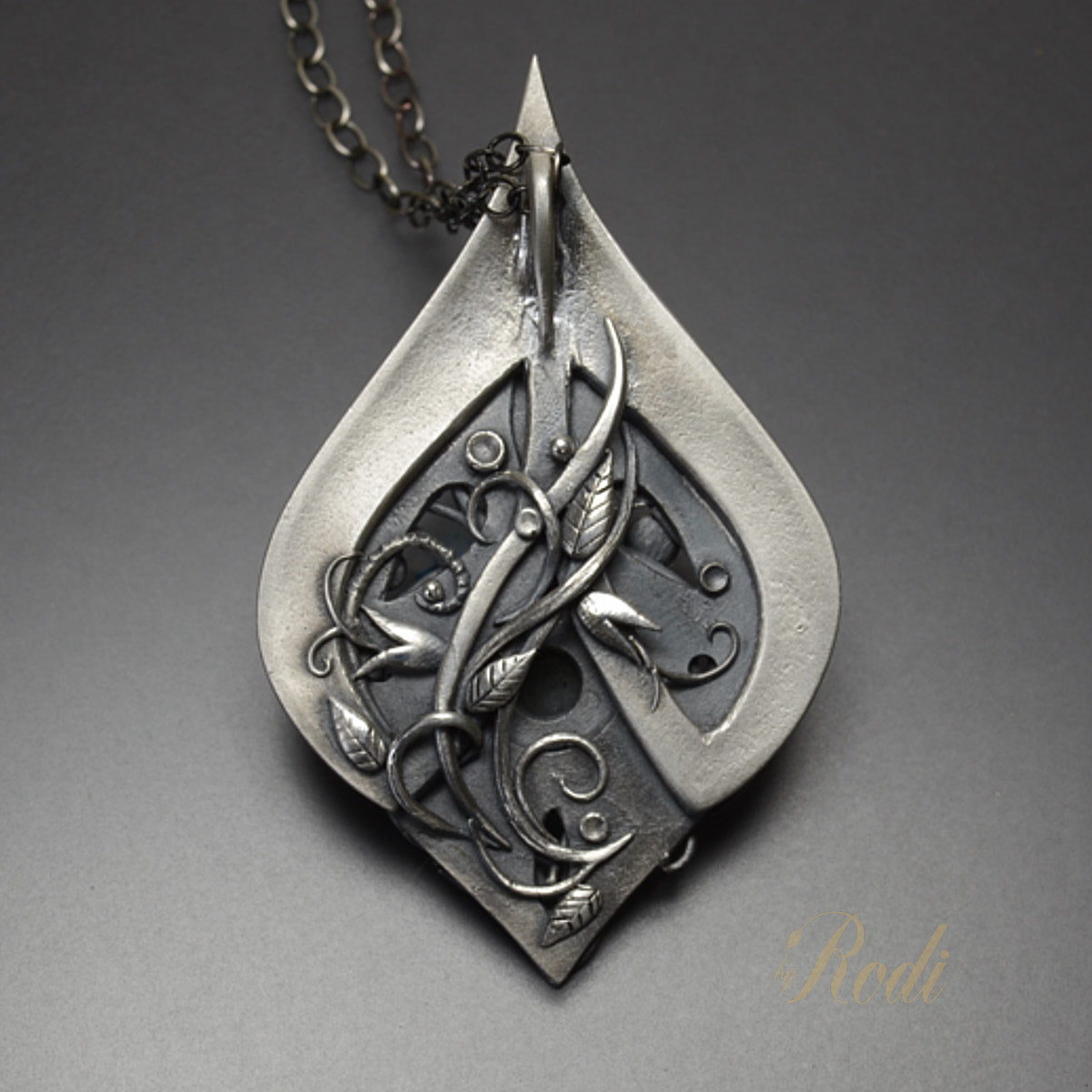 https://metalclayadventures.com/cdn/shop/products/Crescere_Silver_Pendant_-_by_Rodi_Frunze02_051a3085-0e1d-4d11-ba6b-152d2787a225_5000x.jpg?v=1665190179